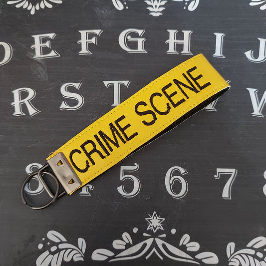 CRIME SCENE TAPE WRISTLET KEYFOB